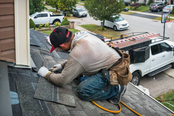 Professional Storm Damage Roof Repair technician working in New Wilmington, PA